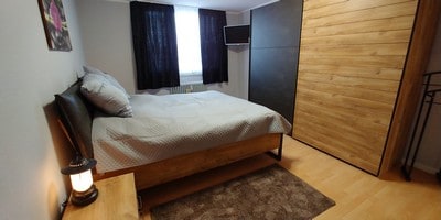 Apt-10_master-bedroom-with-TV